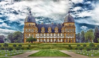 Seehof Palace on a background of cloudy sky