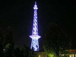 cityscape of Illuminated radio tower in Berlin