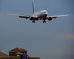 the plane flies near the airport