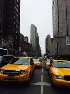 yellow taxis on the streets of new york