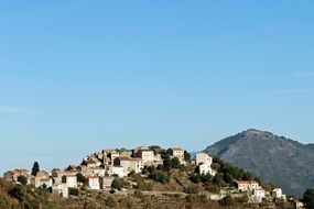 houses on the coastline in Corsica