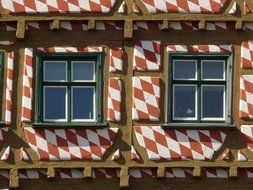 small windows on the farm building