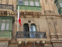 balconies on the facade of the building