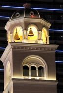 illuminated bell tower at night