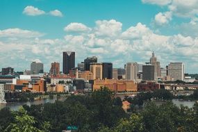 cityscape of modern downtown and river