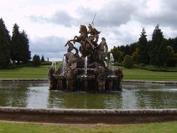 equestrian stone sculpture in fountain