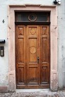 entrance with an old wooden door