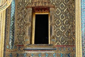 golden entrance to a buddhist temple