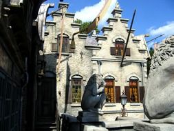 stone lions in front of old building