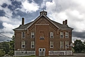 old brick building in summer