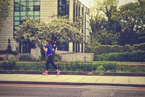 jogger, young girl training in city