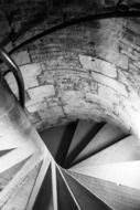 stone spiral stairs in a castle tower