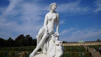 female monument on the background of the city