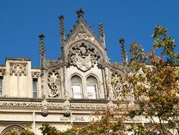 beautiful stone carving at top of historical building