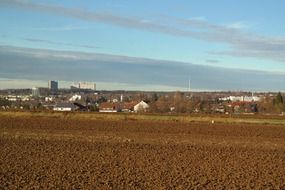 arable field and private houses in stuttgart suburb