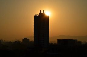 Building against the sunset light