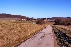 road in scenic countryside at fall, germany, detmold