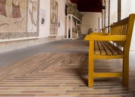 wooden bench in a museum in Rome