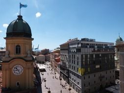 tower with a flag in the city center