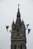 belfry of ghent with flags
