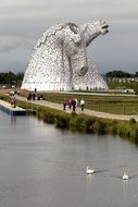 metal statue of horse heads in Helix park