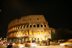 the colosseum roman in Italy at night
