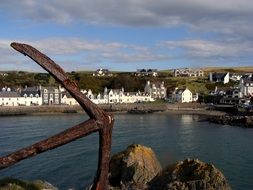 rusty anchor on the coast