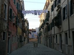 laundry on lines across alley, italy, venice