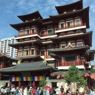 crowd of people at asian style building in singapore, chinatown