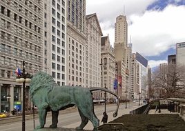 lion statue near skyscrapers in chicago