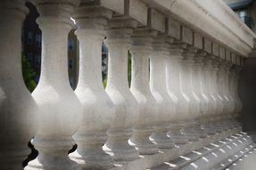 white balustrade in light and shadow close-up