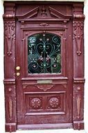 wooden entrance door with wrought iron