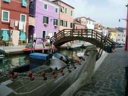 a wooden bridge over a canal in Florence