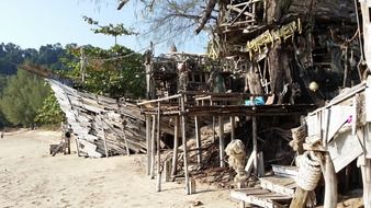 bar made of flotsam on the beach in Thailand