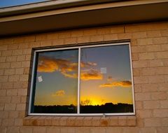 Reflection of sunset sky on a window
