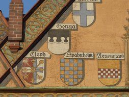 coat of arms on a facade wall