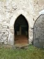 Open door of the stone entry