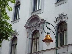 copper street lamp near the building