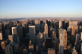 panoramic view of skyscrapers in manhattan at sunset