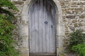 wooden door in a stone building