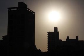 sunset buildings silhouettes