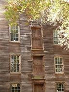 old wooden building of grist mill, facade, detail