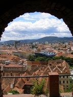arch framed old town panorama, austria, graz