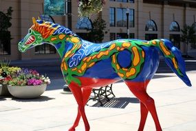 Colorful statue of a horse in the street