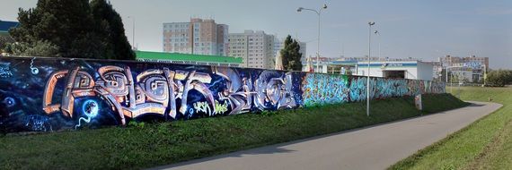 colorful graffiti on the fence