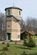 water tower among the plants in poland