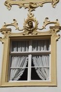 Baroque window with clay modelling