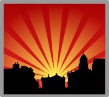 silhouette of city houses on a background of red sky