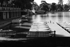 Black and white photo of boats and country house in Madrid