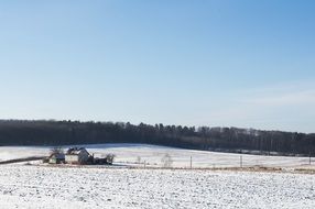 farmhouse in the countryside in winter